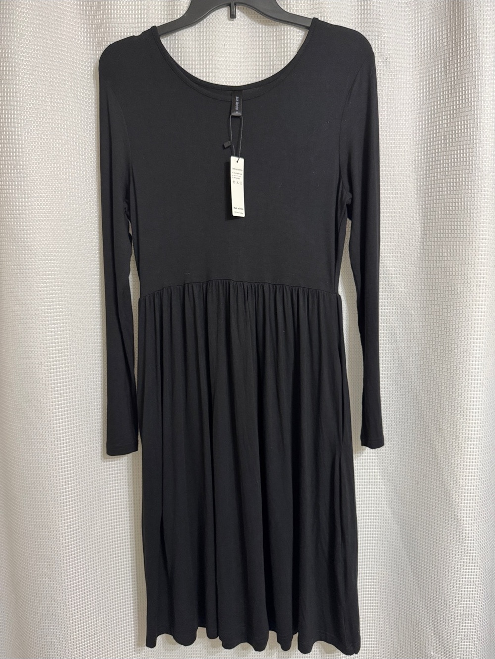 NWT DB MOON jet black long sleeve dress. Size M.